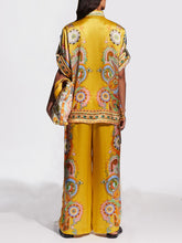 Pantalones anchos y holgados con estampado de flores de anacardo y satén exquisito